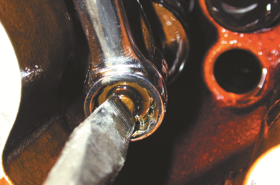 If the valve clearance (lash) is not correct, loosen  the retaining nut and turn the valve adjusting ...