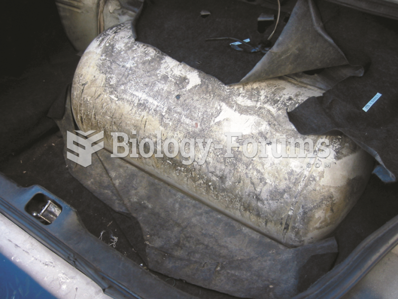 Propane fuel storage tank in the trunk  of a Ford taxi.