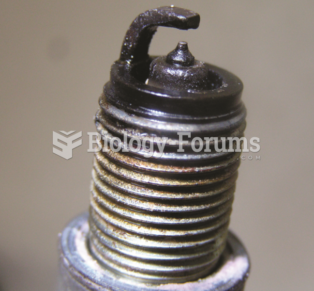 A platinum tipped spark plug that is  fuel soaked indicating a fault with the fuel system or  the ...