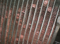 A heavily corroded radiator from a vehicle that was overheating. A visual inspection discovered that ...
