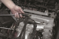 Remove all of the spark plugs. Be sure to mark the spark plug wires so that they can be reinstalled ...