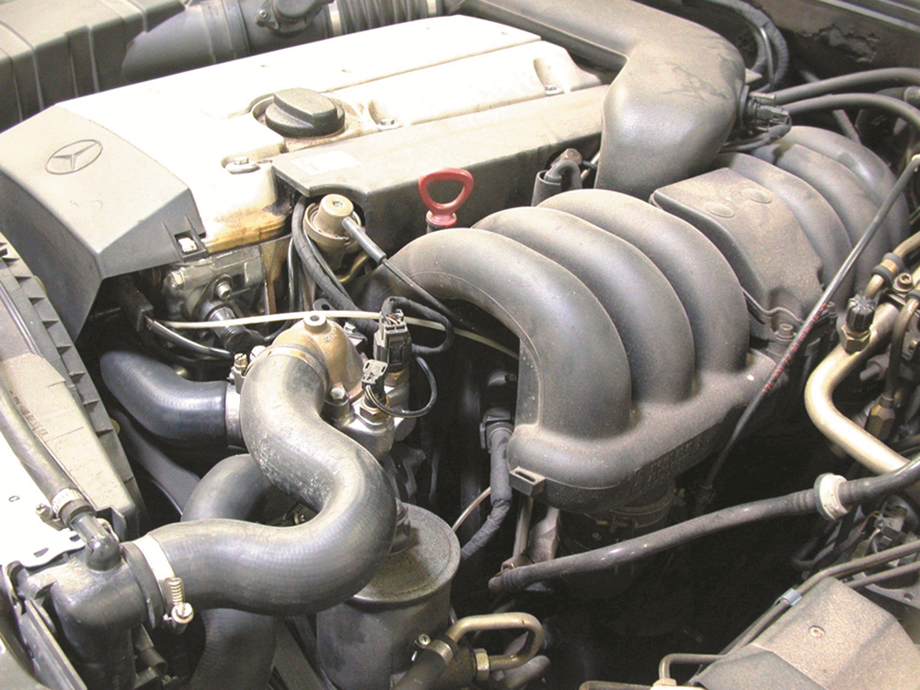 A port fuel-injected engine that is equipped with long, tuned intake-manifold runners.