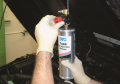 Hang the canister from the vehicle’s hood and adjust  the air pressure regulator to full OPEN ...