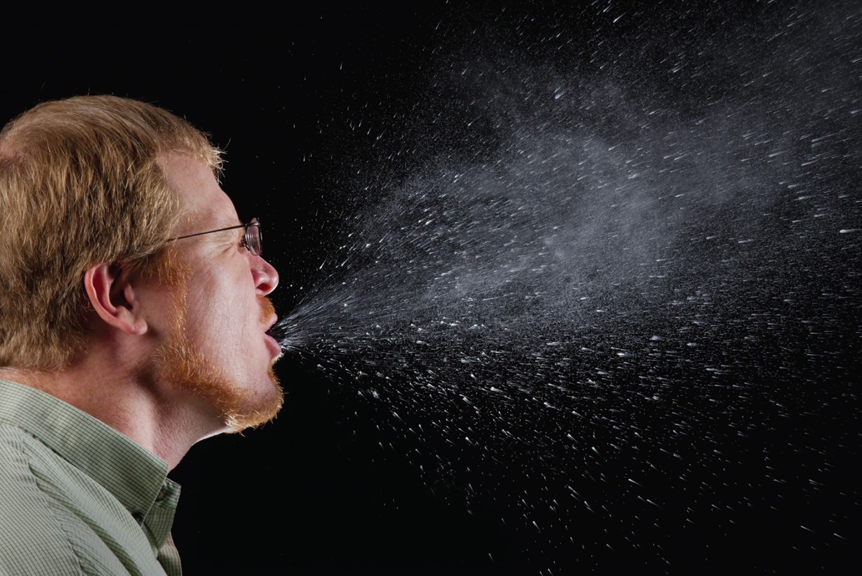 This image shows the spread of droplets from an uncovered sneeze. 