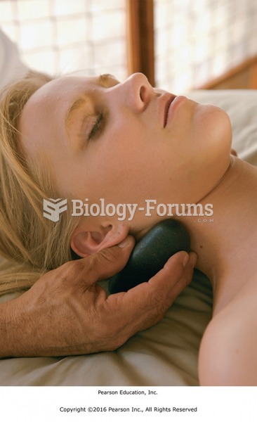 Using a hot stone to massage the neck.