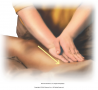 Warming effleurage to thigh muscles. Use reinforced palm over palm method to apply deeper pressure ...