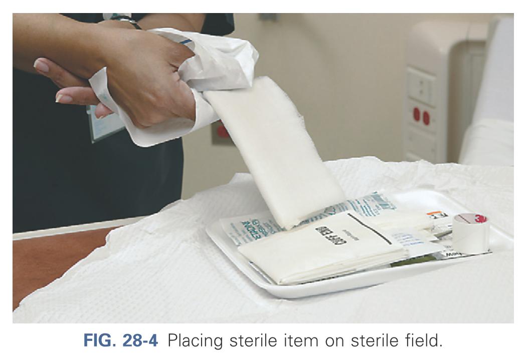 Placing sterile item on a sterile field