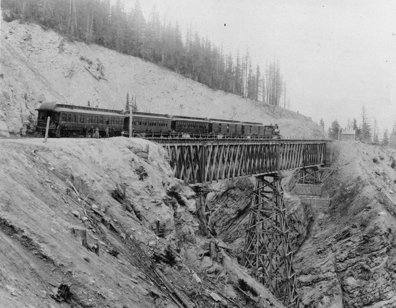 A passenger train crosses Stony Creek Bridge in the Rocky Mountains in 1878. Railroads were importan