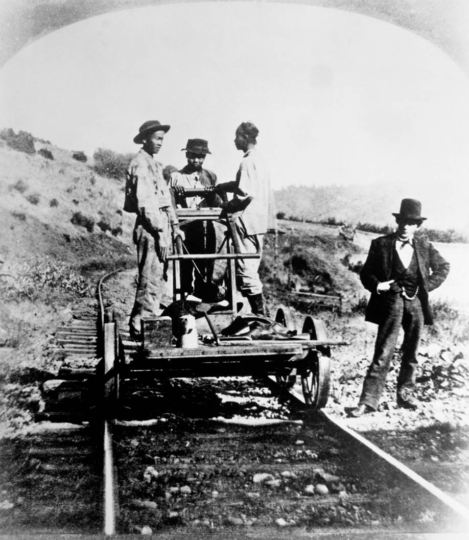 Chinese workers on a railway in the far West. “Without them,” Leland Stanford, president of the Cent