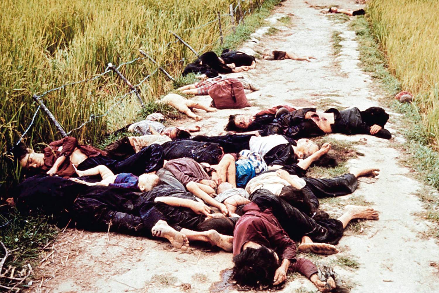 South Vietnamese women and children were among some 300 apparently unarmed civilians killed in a ...