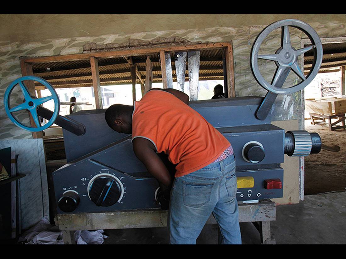 Workshop of Kane Kwei, Coffin in the shape of a film projector,  Teshi area, Ghana, Africa. 2013.