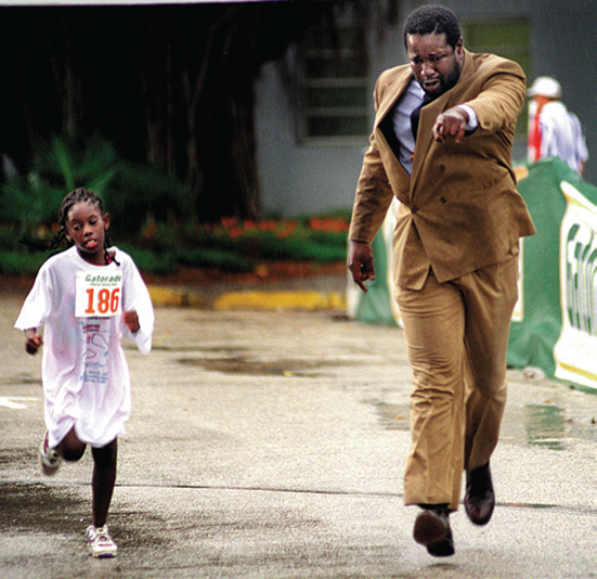 This photo captures an extreme form of family socialization. The father seems to be more emotionally ...