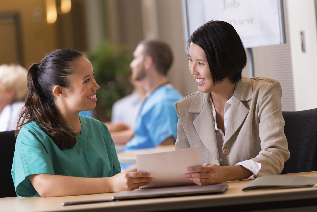 Medical assistant extern clarifying externship issues with the office manager. 