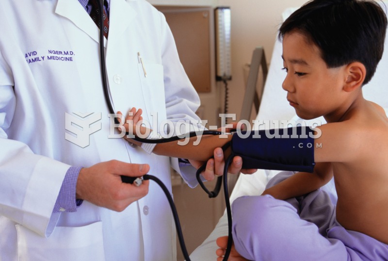Sphygmomanometry. Photograph of a physician taking blood pressure readings with the use of a sphygmo