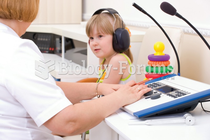 Audiometry. The child in this photograph is undergoing a hearing test with an audiologist.  