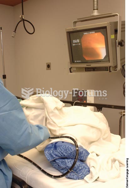 A physician is performing a colonoscopy on a client and viewing the internal structures of the colon