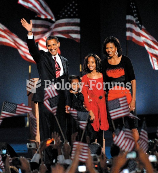 President-elect Barack Obama, his daughters, and wife, Michelle, celebrate his victory in November 2