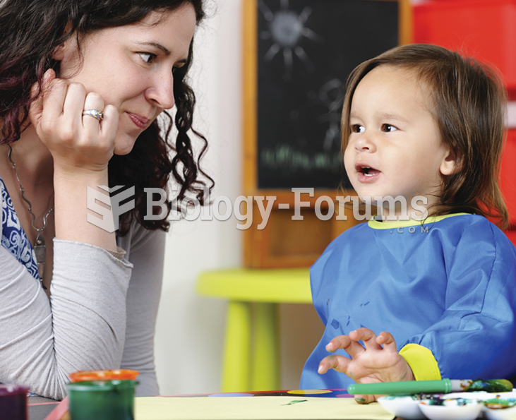 A little girl talking to her mother, who looks amused. 