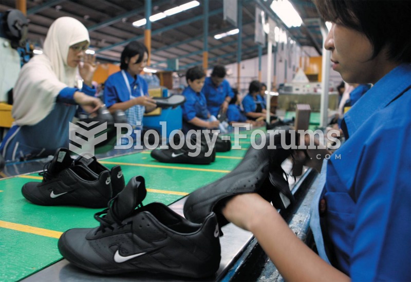 Workers at a Nike factory in Indonesia insert soles into sneakers for fourteen cents an hour.