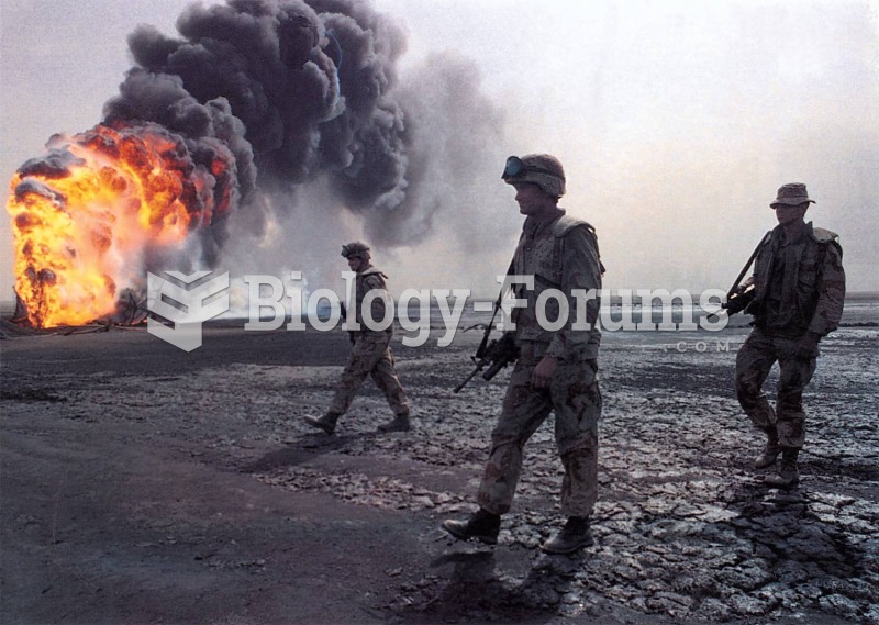 American soldiers advance past a burning oil well. As the routed Iraqi army fled Kuwait, it ignited ...