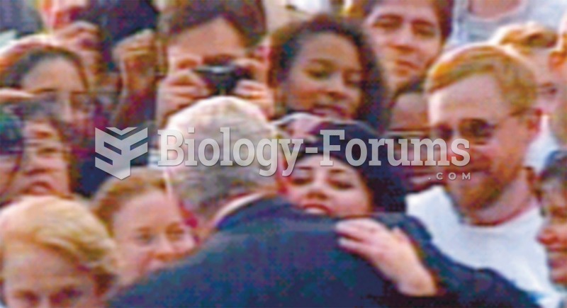 A seemingly anonymous well-wisher from the crowd greets President Bill Clinton. When Clinton was ...