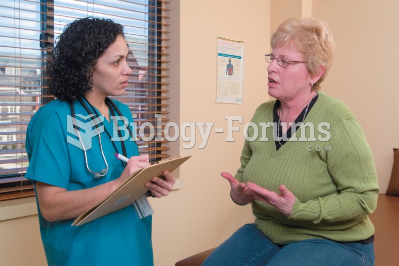 Medical assistant interviewing a patient.