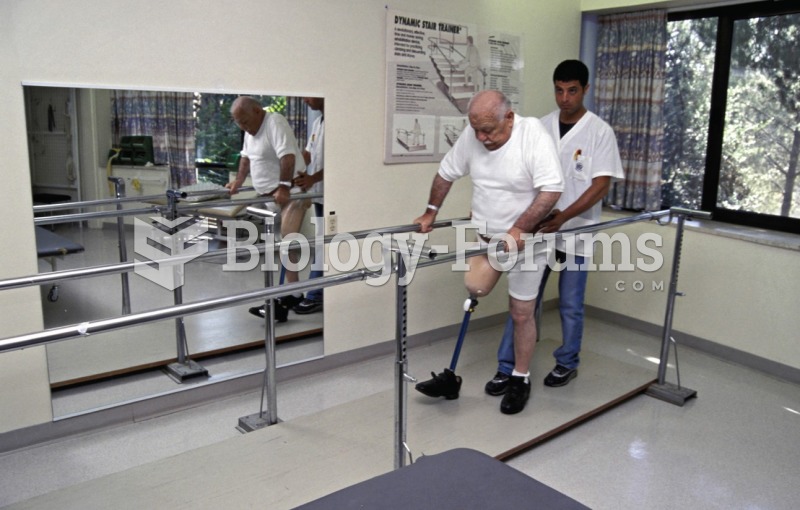  A therapist assisting an amputee patient to regain mobility and strength after amputation. 