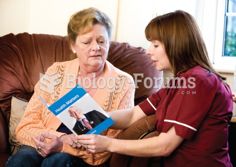 Using educational materials, the medical assistant discusses lifestyle changes with a diabetic ...