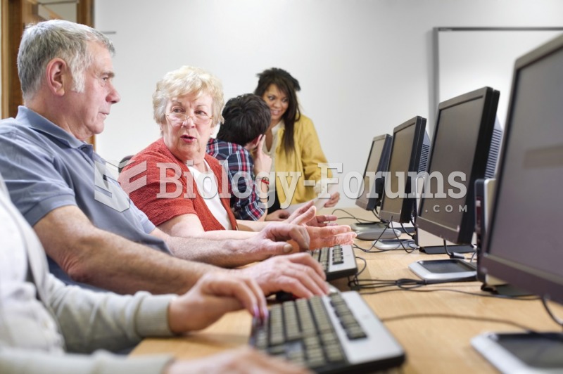 Taking an interesting course can help keep your brain active. These seniors are taking a class in ...
