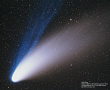 The sparse plasma (blue) and dust (white) in the tail of comet HaleÃƒÂ¢Ã¢â€šÂ¬Ã¢â‚¬Å“Bopp are being 