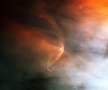 Bow shock formed by the magnetosphere of LL Orionis (center) as it collides with the Orion Nebula fl
