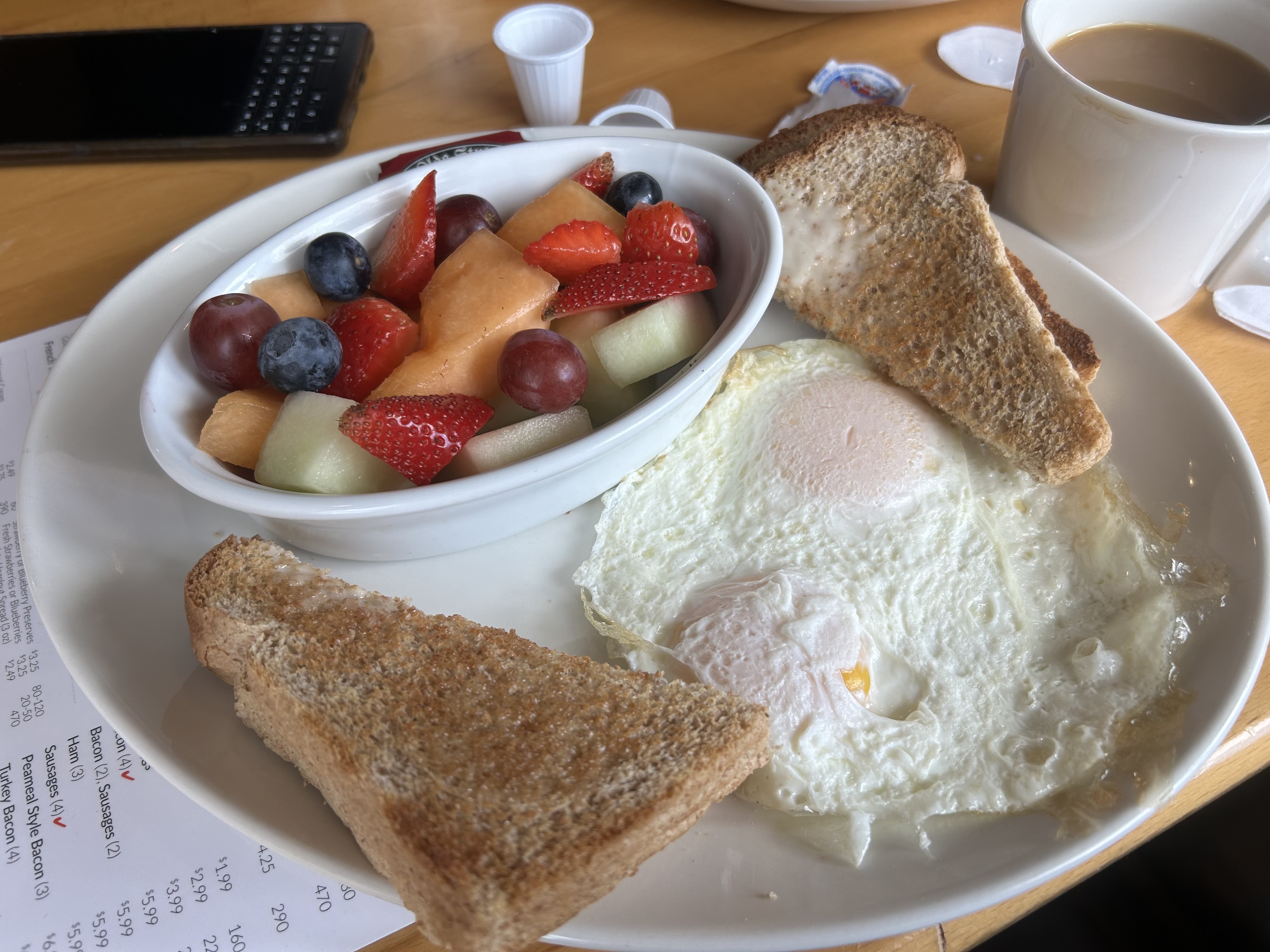 Eggs and fruit salad breakfast